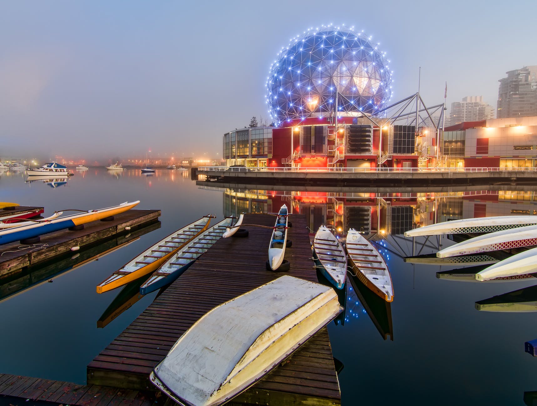canoes beside dock in Vancouver